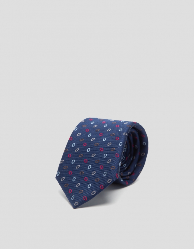 Navy blue tie with red, silver and brown jacquard with oval design