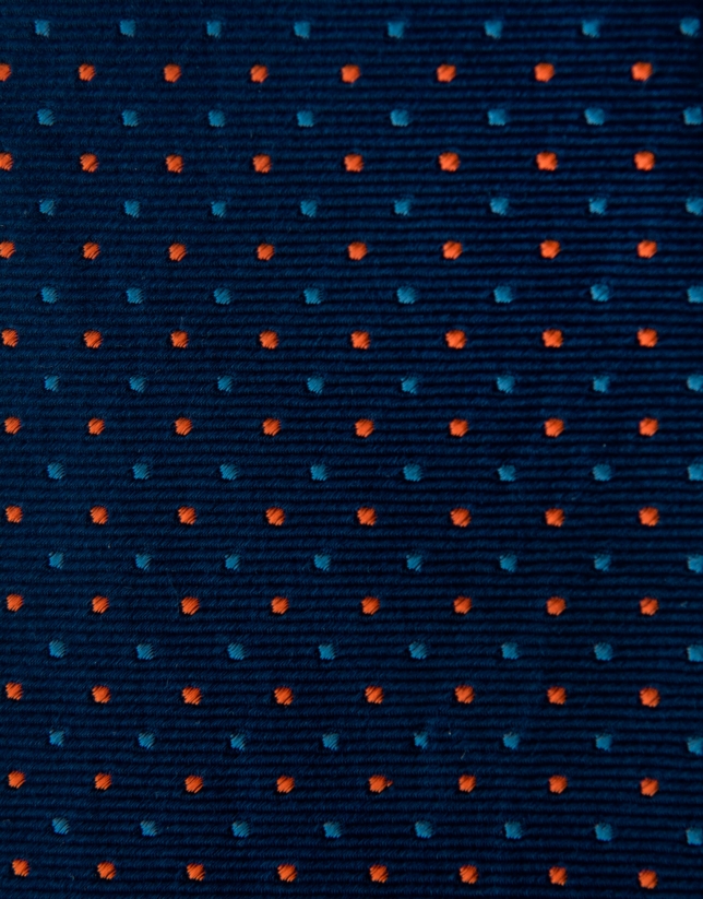 Navy blue silk tie with light blue and orange dots