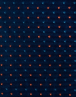 Navy blue silk tie with light blue and orange dots