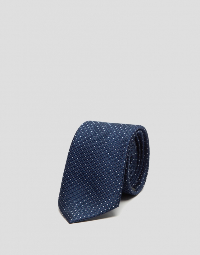 Navy blue silk tie with purple and white dots