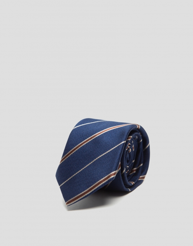 Navy blue silk tie with gray and brown stripes