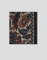 Beige scarf with blue, orange and brown paisley print