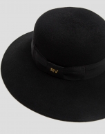 Black felt hat with ribbon and bow