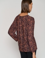 Long sleeve geometric print blouse in eggplant and black