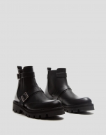 Black leather ankle boot with track sole