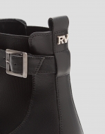 Black leather ankle boot with track sole