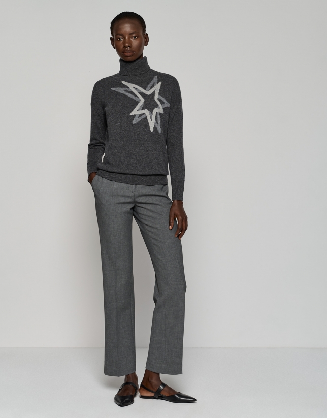 Dark gray sweater with raised collar and star