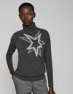 Dark gray sweater with raised collar and star