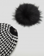 Black and white raccoon pompom