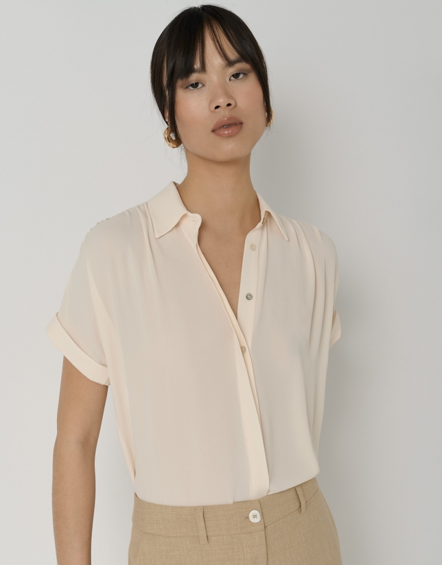 Beige voile blouse with puckered shoulders