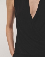 Black knit top with draped collar