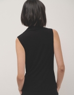 Black knit top with draped collar