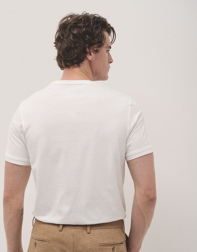 White T-shirt with logo embossed chest