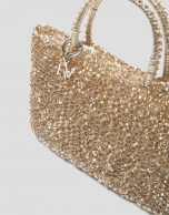 Bolso de mano trenzado dorado Devyn Flat