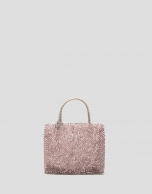 Bolso de mano trenzado rosa claro Devyn Flat