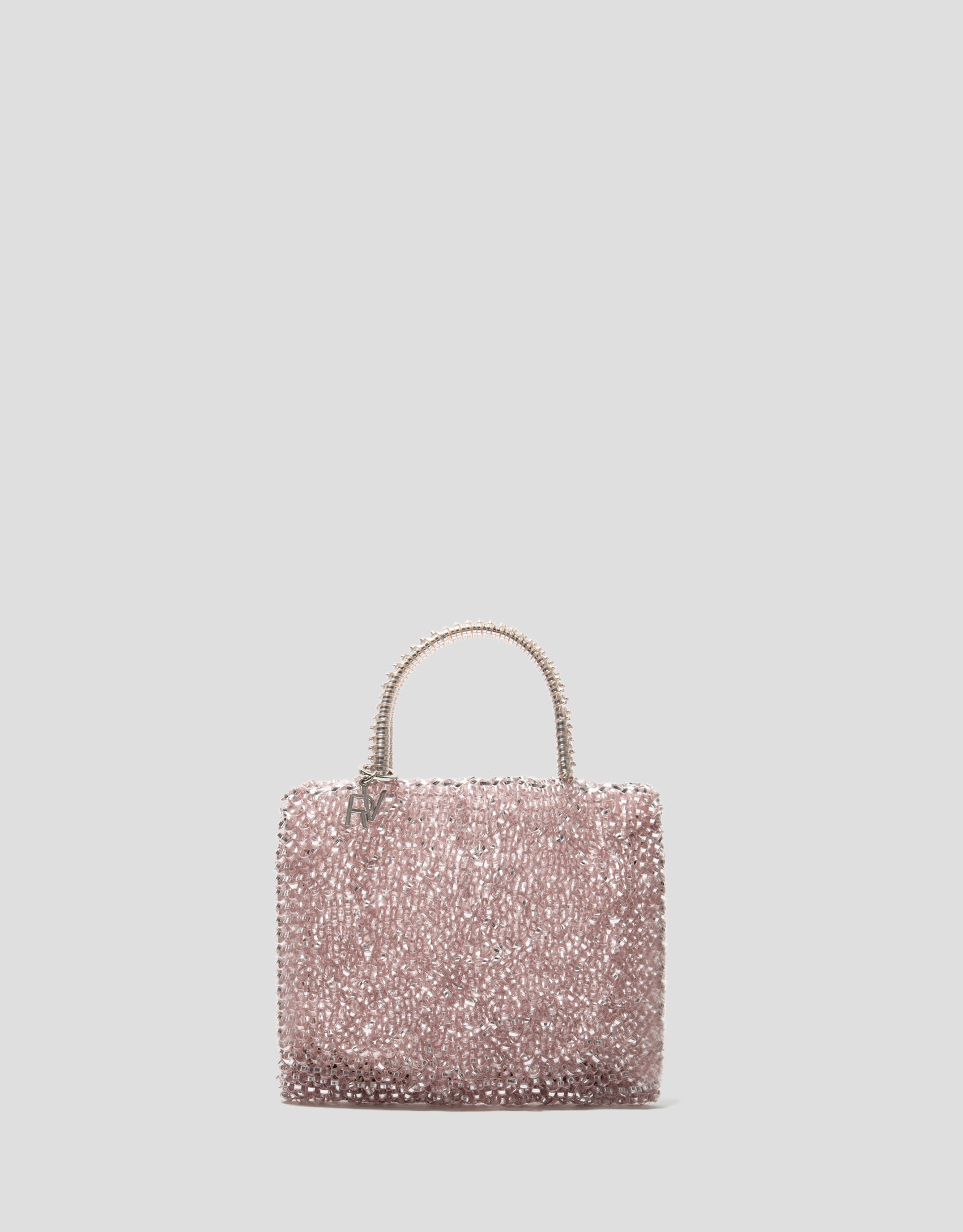 Bolso de mano trenzado rosa claro Devyn Flat