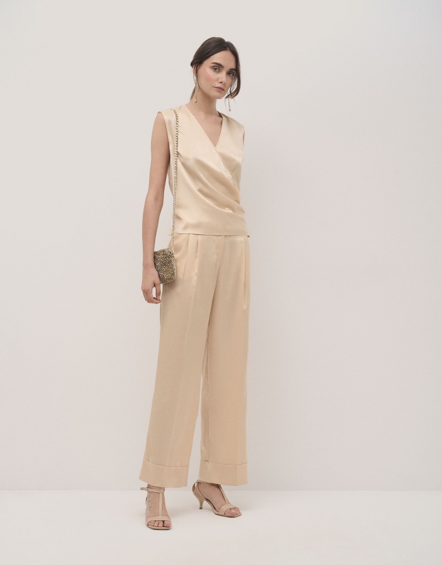 Beige crepe satin tailored pants with rolled-up hem