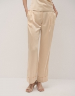 Beige crepe satin tailored pants with rolled-up hem