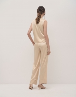 Beige crepe satin tailored pants with rolled-up hem