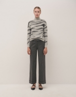 Grey tailored herringbone and discontinuous pinstriped pants with rolled-up hem