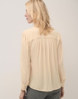 Blouse with bow in mustard flaire crepe