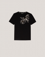 Black cotton top with embroidered beige flower