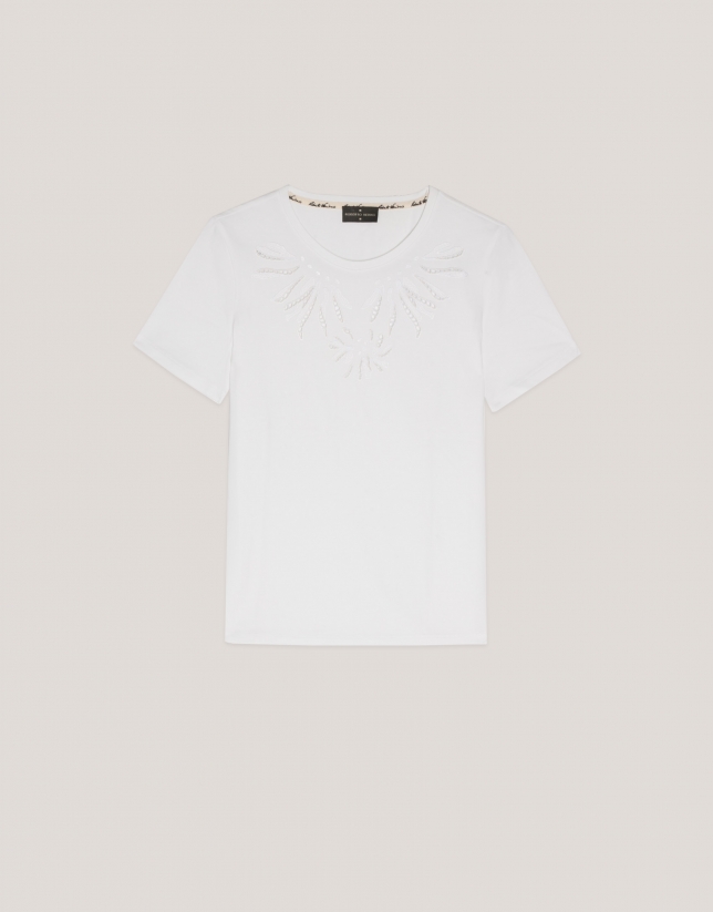 White cotton top with openwork embroidered flower