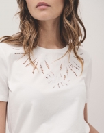 White cotton top with openwork embroidered flower