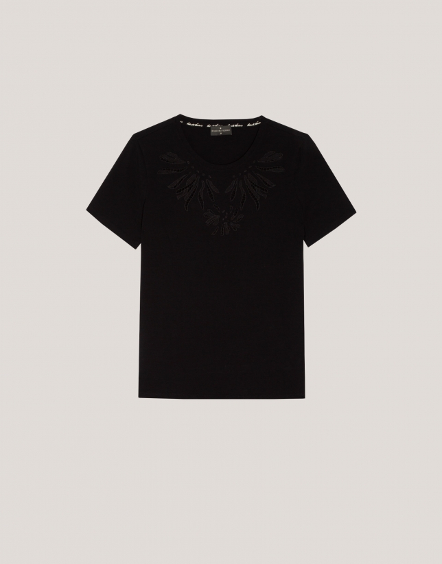 Black cotton top with openwork embroidered flower