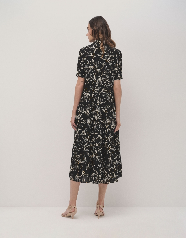 Black shirtwaist midi dress with beige floral. Roberto Verino