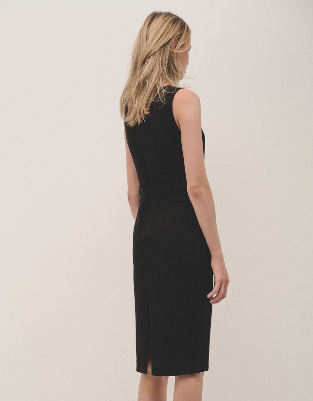 Black sleeveless dress with belt in cut knitted fabric