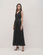 Sleeveless long dress in black lame