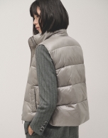 Grey quilted vest with ecru lining