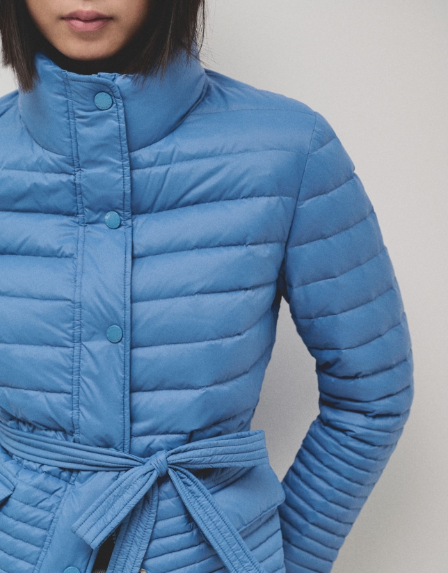 Blue ski jacket with ecru inside