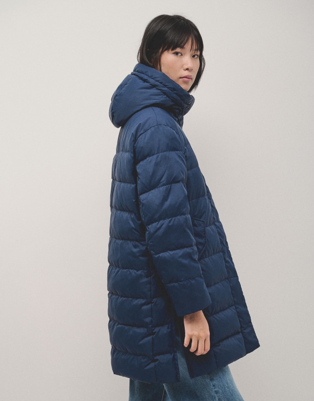 Long navy quilted coat with camel interior