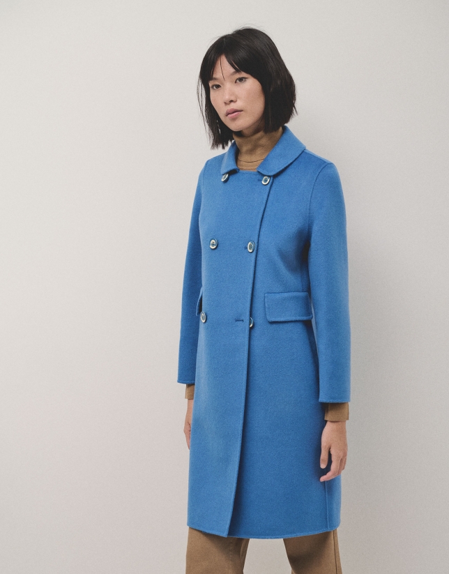 Long straight double-breasted coat in double-faced blue cloth