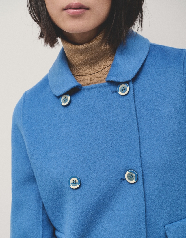 Long straight double-breasted coat in double-faced blue cloth