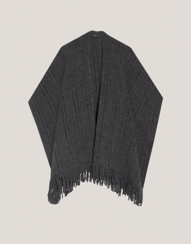 Grey knitted poncho with fringes