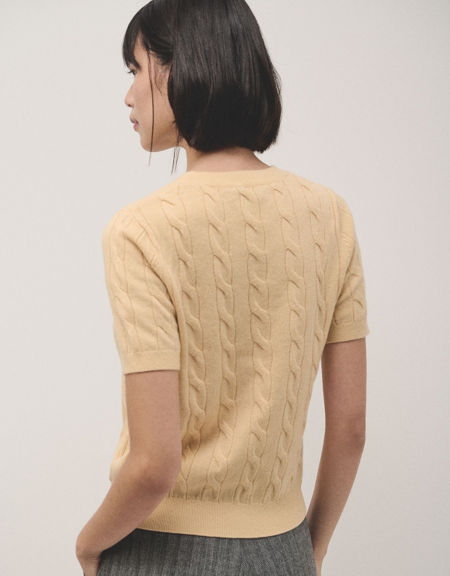 Yellow short sleeves T-shirt in woollen cable-stiched and stripes knit.