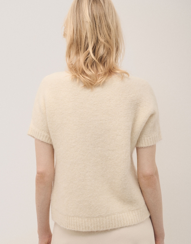 Beige short sleeved oversize jumper with a star