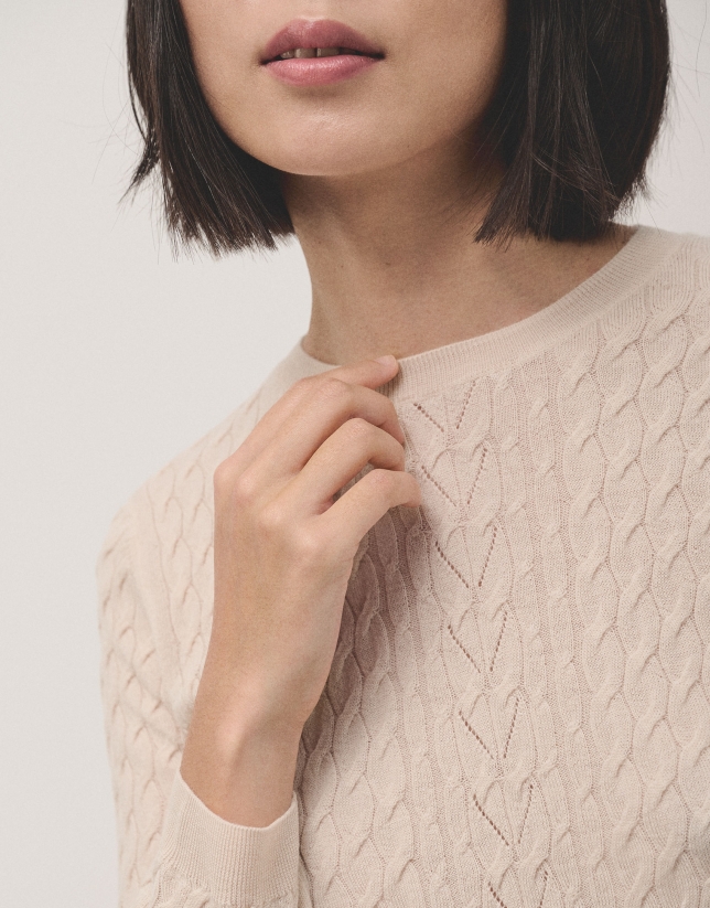 Long sleeves jumper in beige woollen cable-stitch with a front stripe knitted