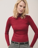 Red ribbed turtleneck jumper