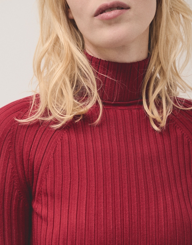 Red ribbed turtleneck jumper