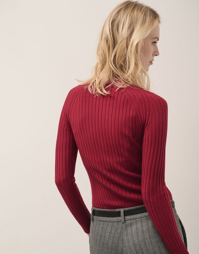 Red ribbed turtleneck jumper