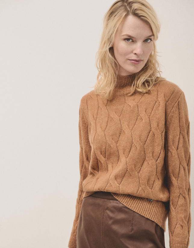 Oversize jumper in a camel chunky cable stitch knitting