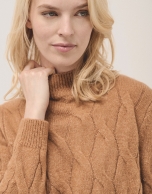 Oversize jumper in a camel chunky cable stitch knitting