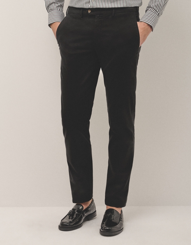 Black dyed chino trousers