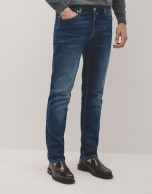 Blue stone-washed denim jeans