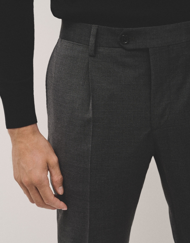 Dark grey dress trousers with turn-up hem