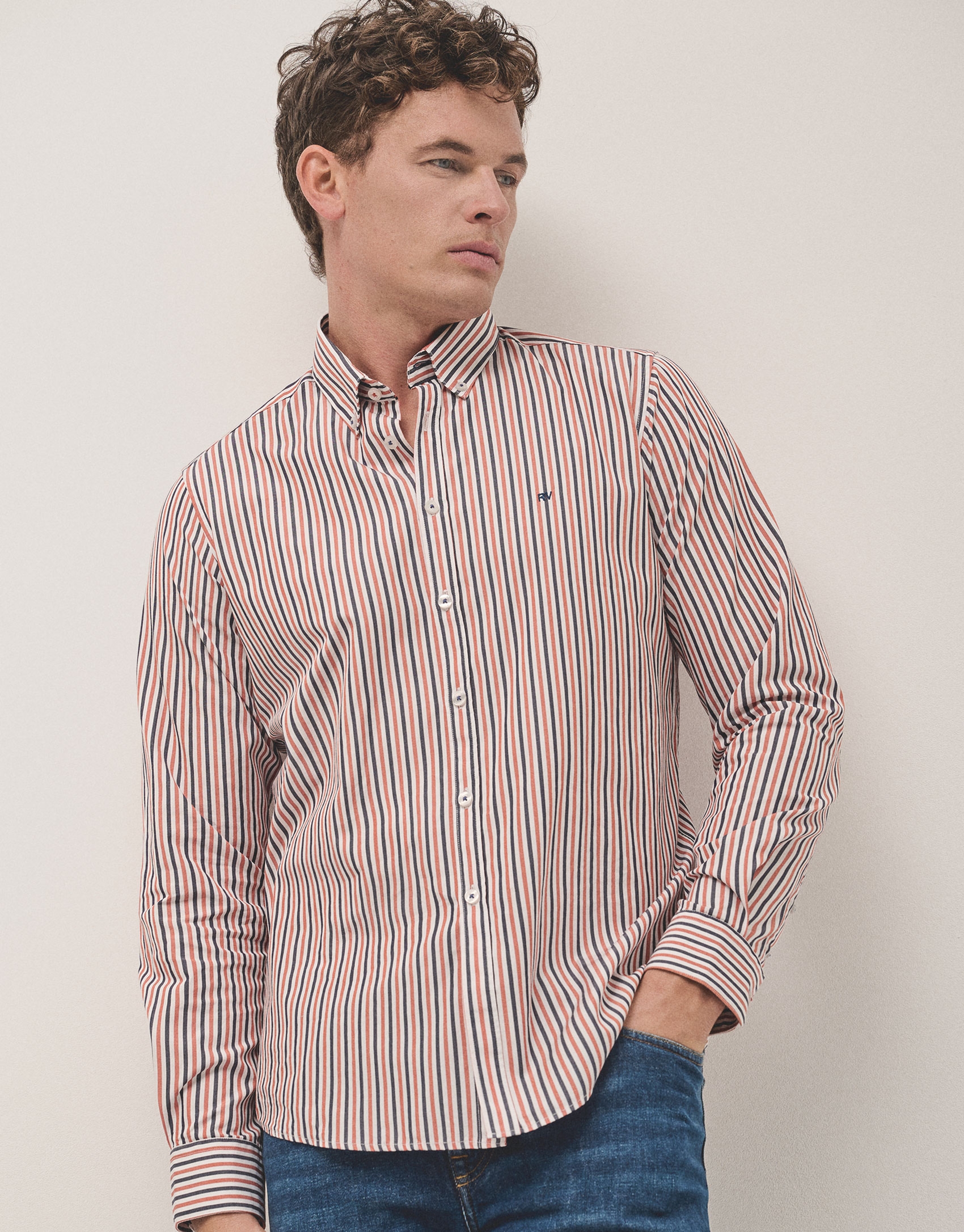 Navy blue and orange striped sport shirt